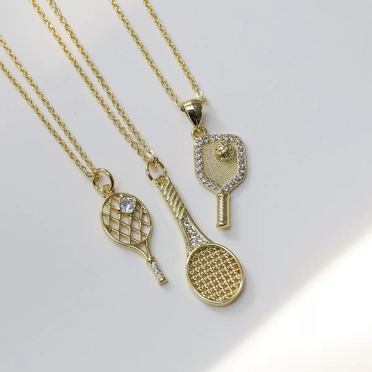 Golden necklace with zircon classic style in 3 models - tennis, padel, pickleball – tennis jewelry in {{ product_color }} | Aura Tide Collective | Shop Golden necklace with zircon classic style in 3 models - tennis, padel, pickleball online for {{ product_tags | join: ", " }} – Fast shipping worldwide.
