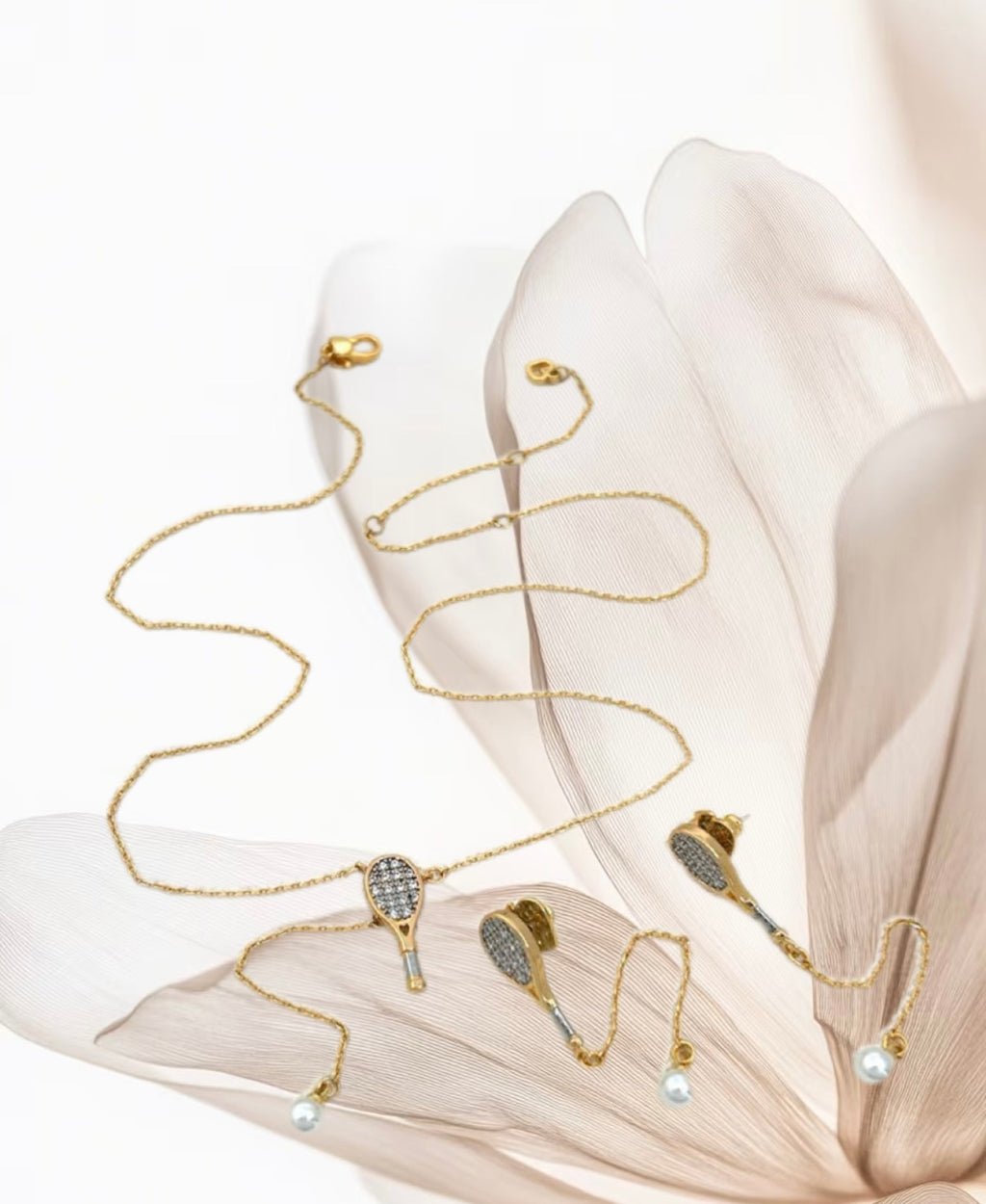 Unique tennis racket collarbone chain earrings – tennis jewelry in {{ product_color }} | Aura Tide Collective | Shop Unique tennis racket collarbone chain earrings online for {{ product_tags | join: ", " }} – Fast shipping worldwide.