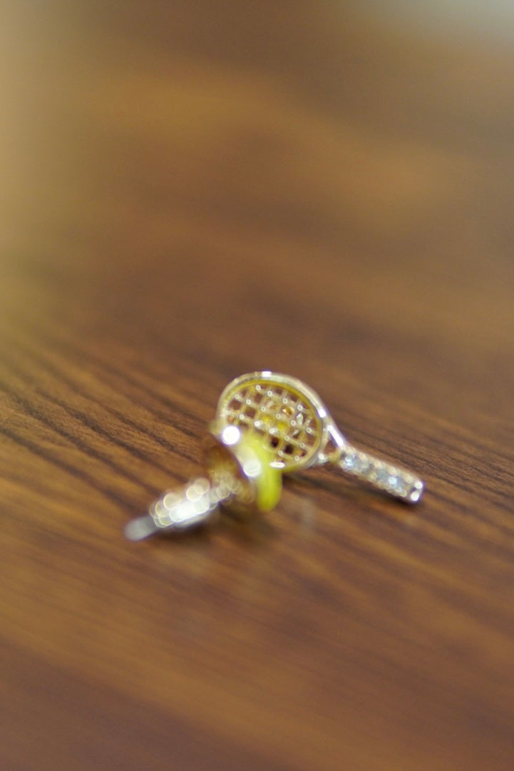classic tennis ear-stud diamond racquet and tennis ball in Titanium-plated Stainless Steel – tennis jewelry in {{ product_color }} | Aura Tide Collective | Shop classic tennis ear-stud diamond racquet and tennis ball in Titanium-plated Stainless Steel online for {{ product_tags | join: ", " }} – Fast shipping worldwide.