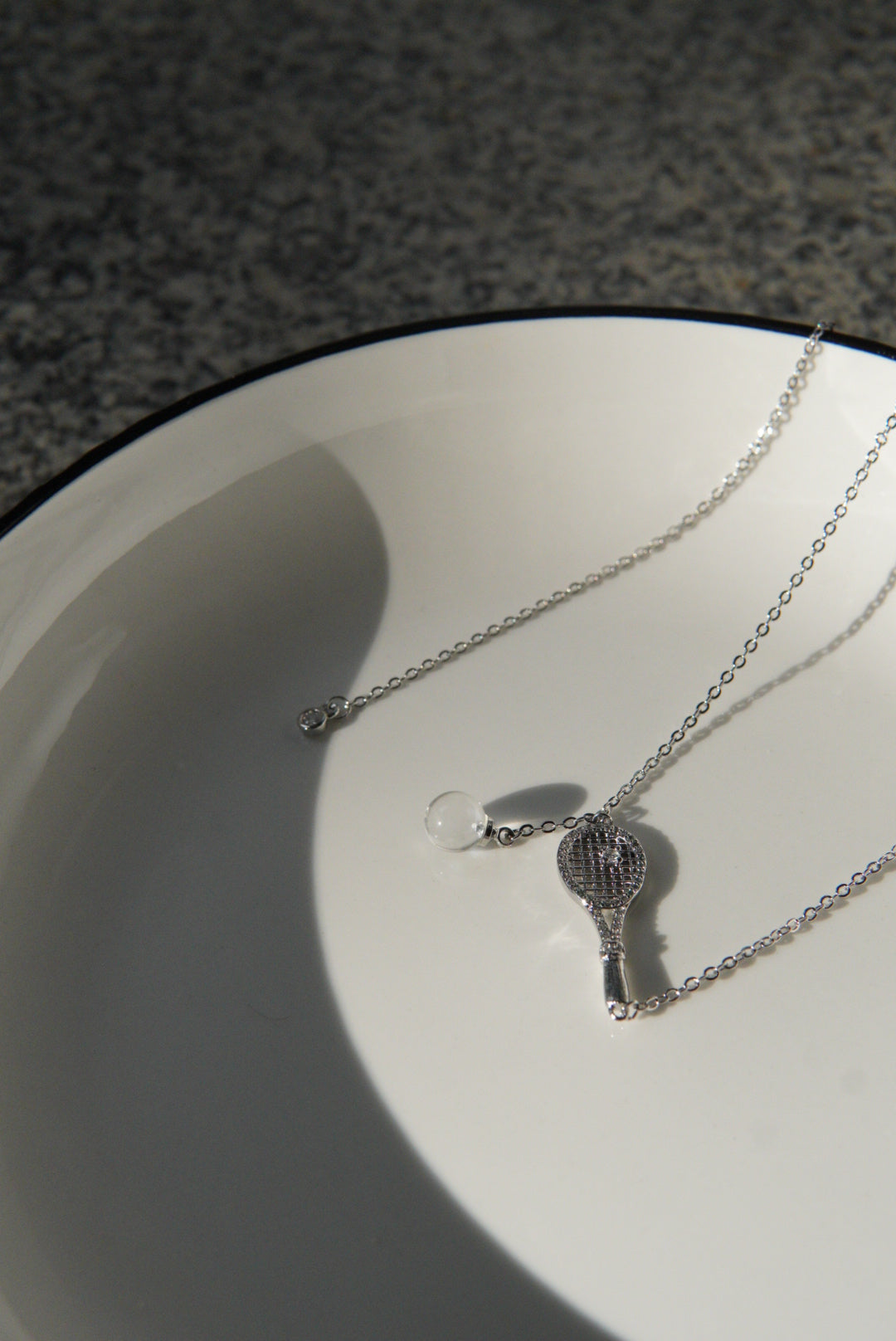 Old-money brushed-finish tennis-racket crystal-ball necklace & bracelet – tennis jewelry in {{ product_color }} | Aura Tide Collective | Shop Old-money brushed-finish tennis-racket crystal-ball necklace & bracelet online for {{ product_tags | join: ", " }} – Fast shipping worldwide.