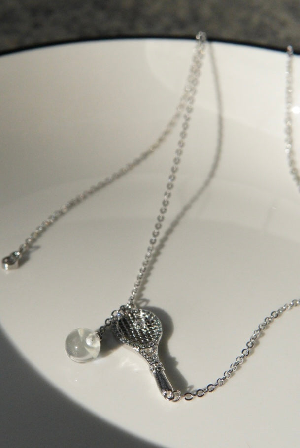 Old-money brushed-finish tennis-racket crystal-ball necklace & bracelet – tennis jewelry in {{ product_color }} | Aura Tide Collective | Shop Old-money brushed-finish tennis-racket crystal-ball necklace & bracelet online for {{ product_tags | join: ", " }} – Fast shipping worldwide.