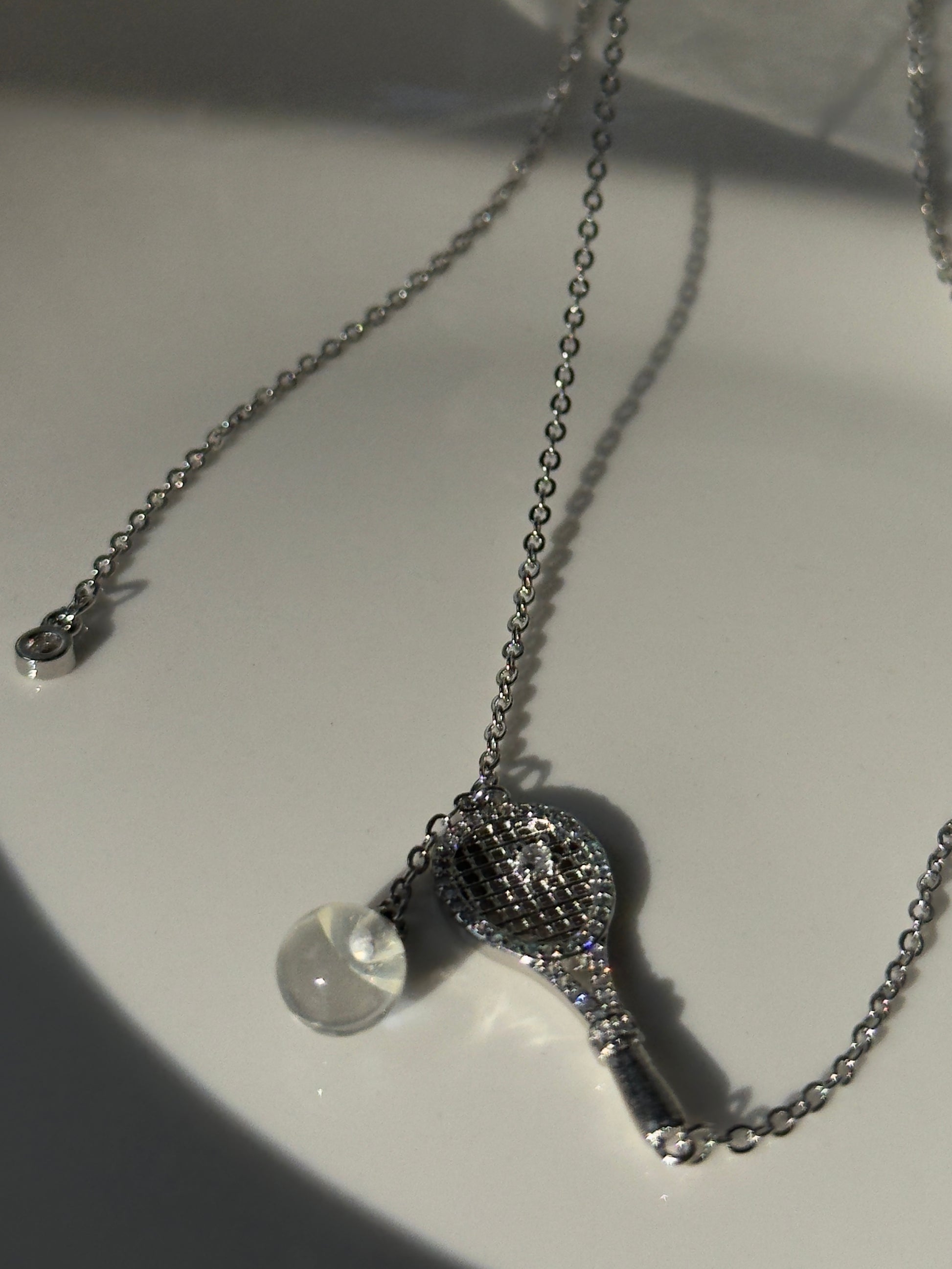 Old-money brushed-finish tennis-racket crystal-ball necklace & bracelet – tennis jewelry in {{ product_color }} | Aura Tide Collective | Shop Old-money brushed-finish tennis-racket crystal-ball necklace & bracelet online for {{ product_tags | join: ", " }} – Fast shipping worldwide.