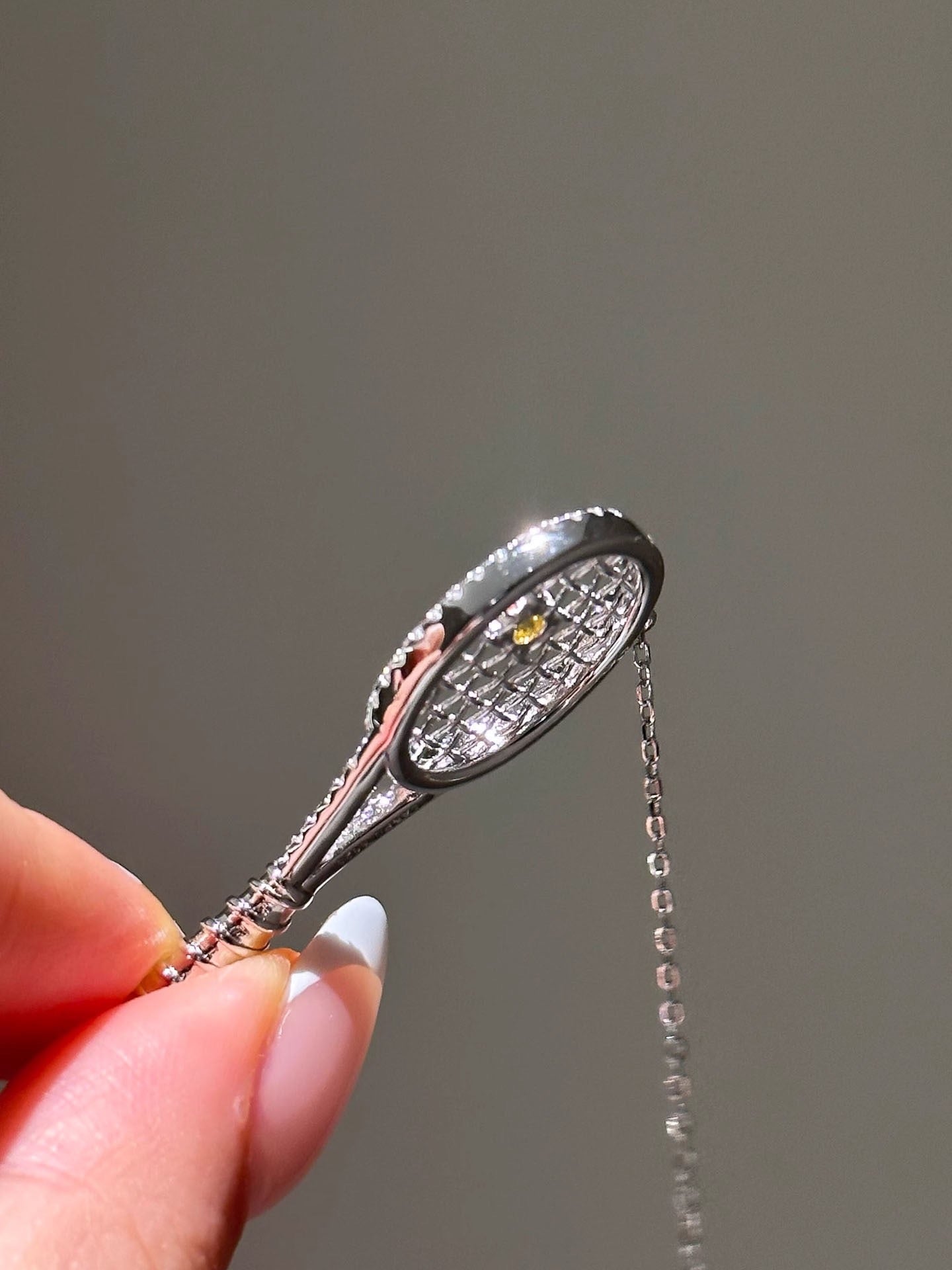 Old-money color-diamond tennis-racket necklace – tennis jewelry in {{ product_color }} | Aura Tide Collective | Shop Old-money color-diamond tennis-racket necklace online for {{ product_tags | join: ", " }} – Fast shipping worldwide.