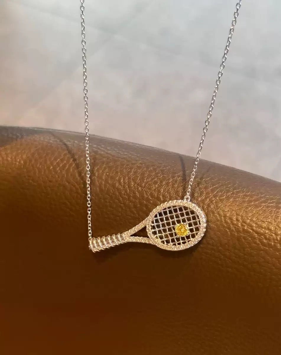 Old-money color-diamond tennis-racket necklace – tennis jewelry in {{ product_color }} | Aura Tide Collective | Shop Old-money color-diamond tennis-racket necklace online for {{ product_tags | join: ", " }} – Fast shipping worldwide.