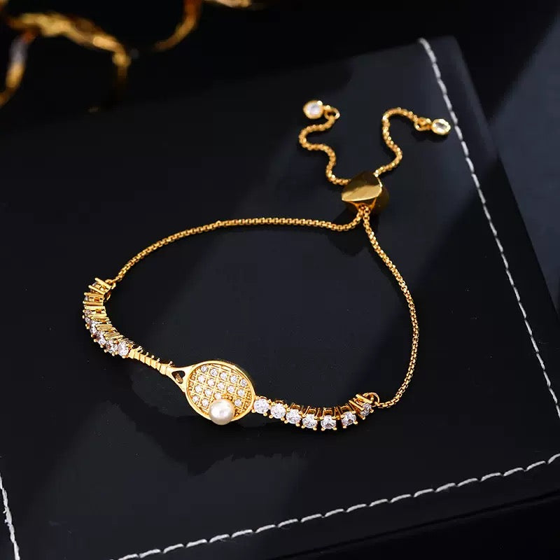 On court Slay Adjustable Tennis Racket Bracelet – tennis jewelry in {{ product_color }} | Aura Tide Collective | Shop On court Slay Adjustable Tennis Racket Bracelet online for {{ product_tags | join: ", " }} – Fast shipping worldwide.