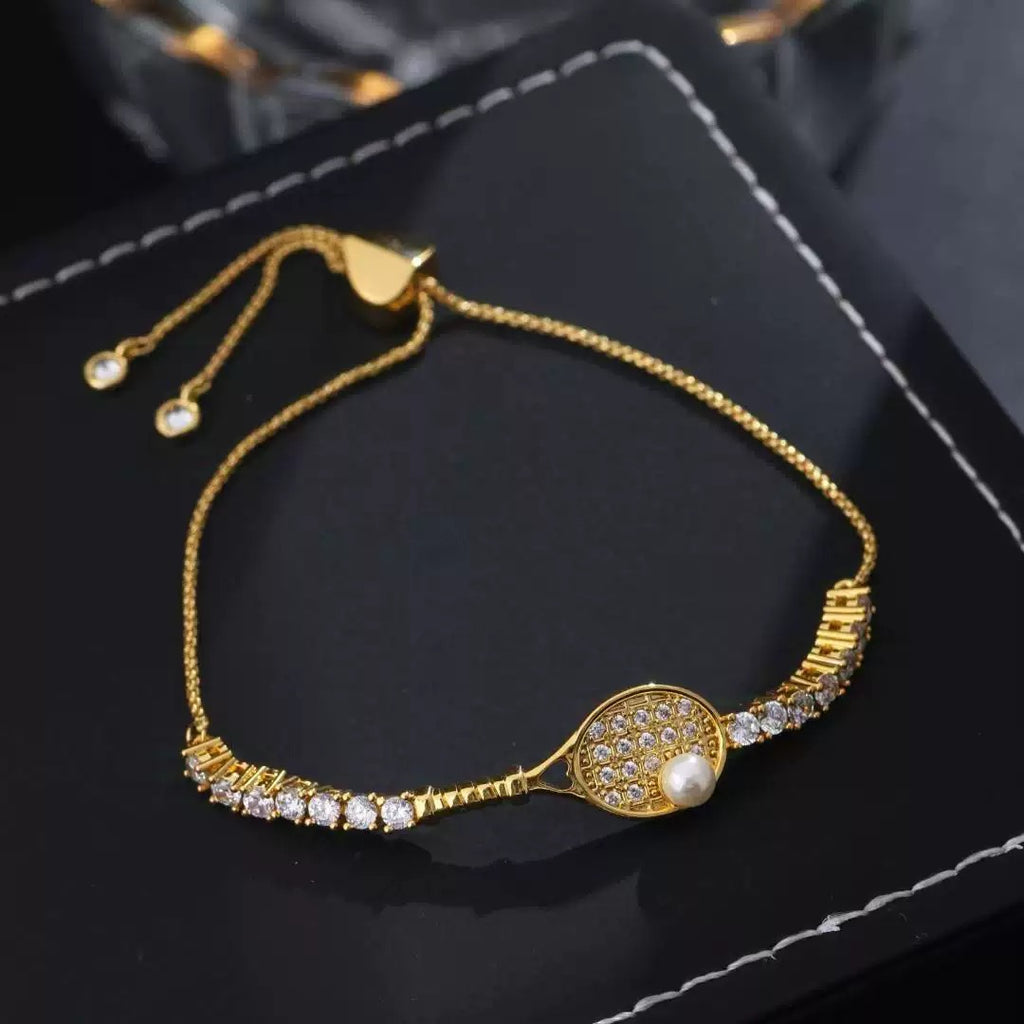 On court Slay Adjustable Tennis Racket Bracelet – tennis jewelry in {{ product_color }} | Aura Tide Collective | Shop On court Slay Adjustable Tennis Racket Bracelet online for {{ product_tags | join: ", " }} – Fast shipping worldwide.