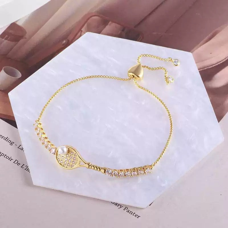 On court Slay Adjustable Tennis Racket Bracelet – tennis jewelry in {{ product_color }} | Aura Tide Collective | Shop On court Slay Adjustable Tennis Racket Bracelet online for {{ product_tags | join: ", " }} – Fast shipping worldwide.