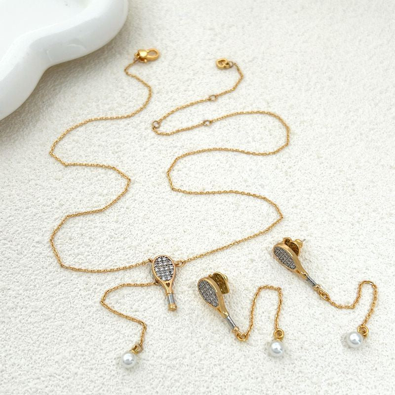 Unique tennis racket collarbone chain earrings – tennis jewelry in {{ product_color }} | Aura Tide Collective | Shop Unique tennis racket collarbone chain earrings online for {{ product_tags | join: ", " }} – Fast shipping worldwide.