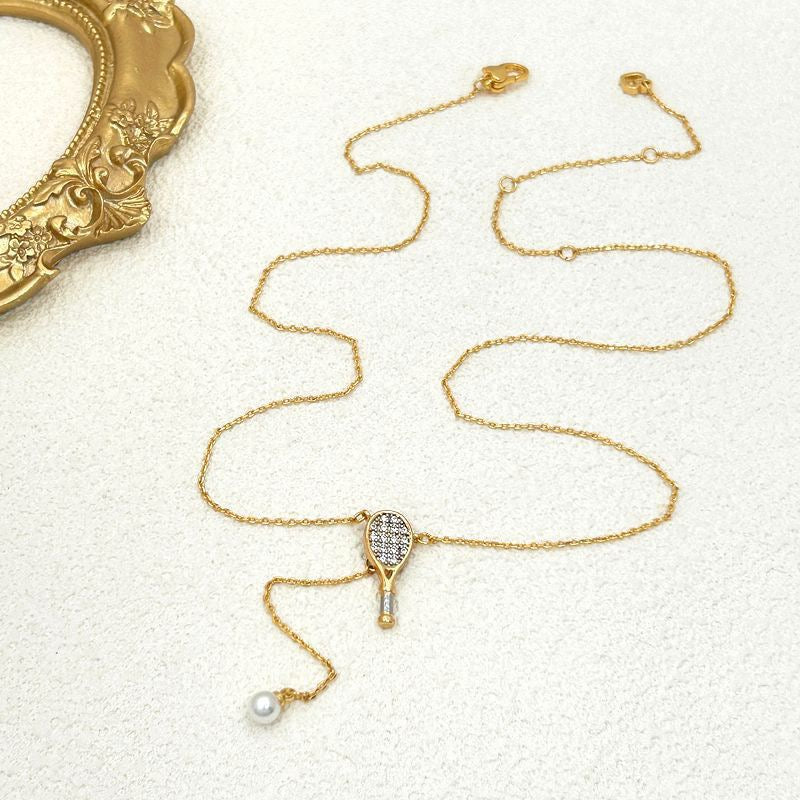 Unique tennis racket collarbone chain earrings – tennis jewelry in {{ product_color }} | Aura Tide Collective | Shop Unique tennis racket collarbone chain earrings online for {{ product_tags | join: ", " }} – Fast shipping worldwide.