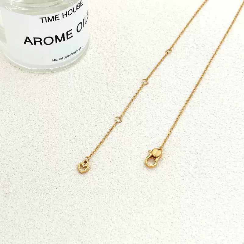 Unique tennis racket collarbone chain earrings – tennis jewelry in {{ product_color }} | Aura Tide Collective | Shop Unique tennis racket collarbone chain earrings online for {{ product_tags | join: ", " }} – Fast shipping worldwide.