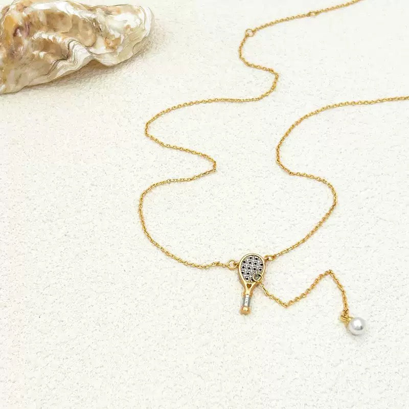 Unique tennis racket collarbone chain earrings – tennis jewelry in {{ product_color }} | Aura Tide Collective | Shop Unique tennis racket collarbone chain earrings online for {{ product_tags | join: ", " }} – Fast shipping worldwide.