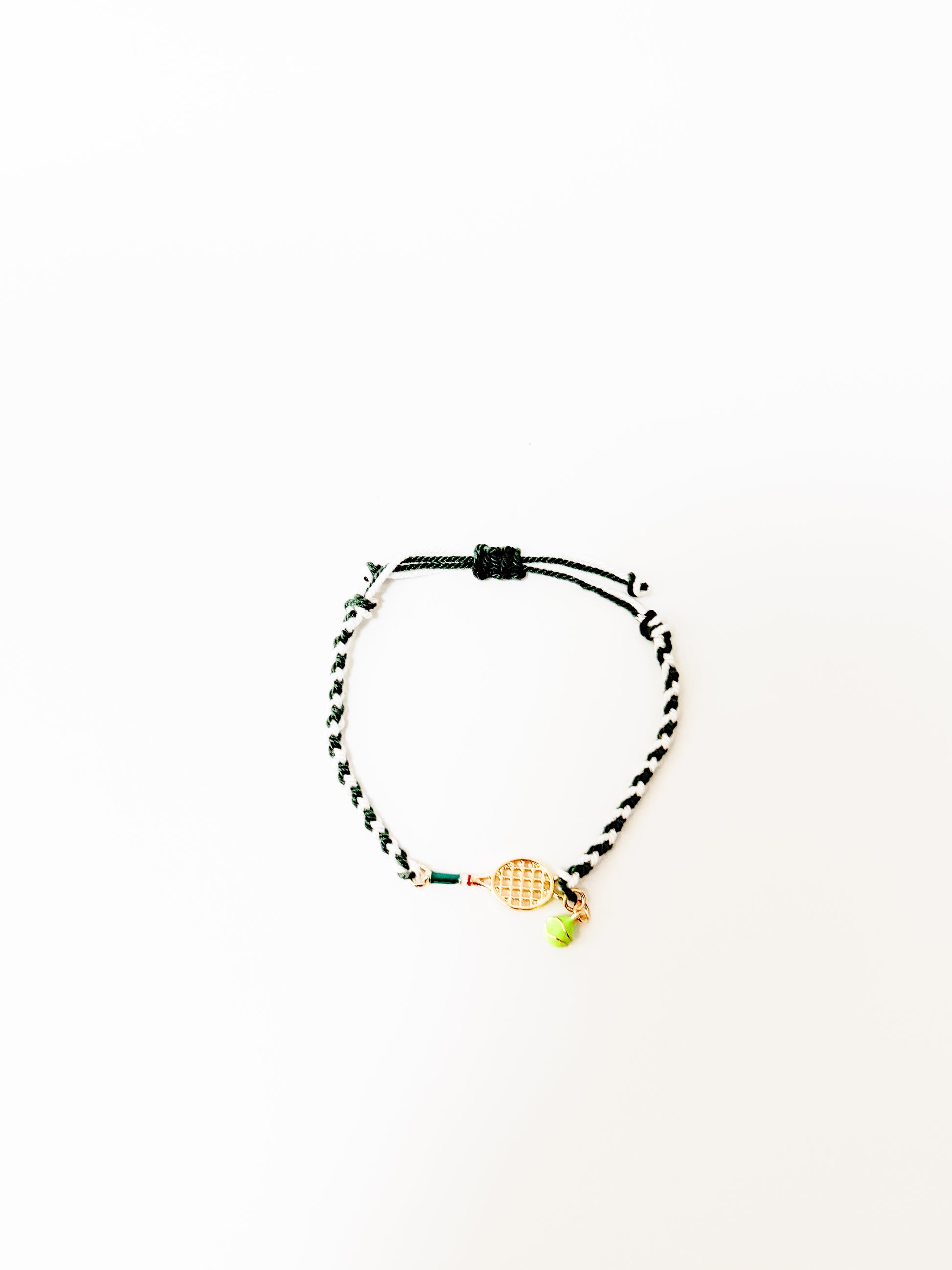 Beading bracelet with steel tennis racquet – tennis jewelry in {{ product_color }} | Aura Tide Collective | Shop Beading bracelet with steel tennis racquet online for {{ product_tags | join: ", " }} – Fast shipping worldwide.