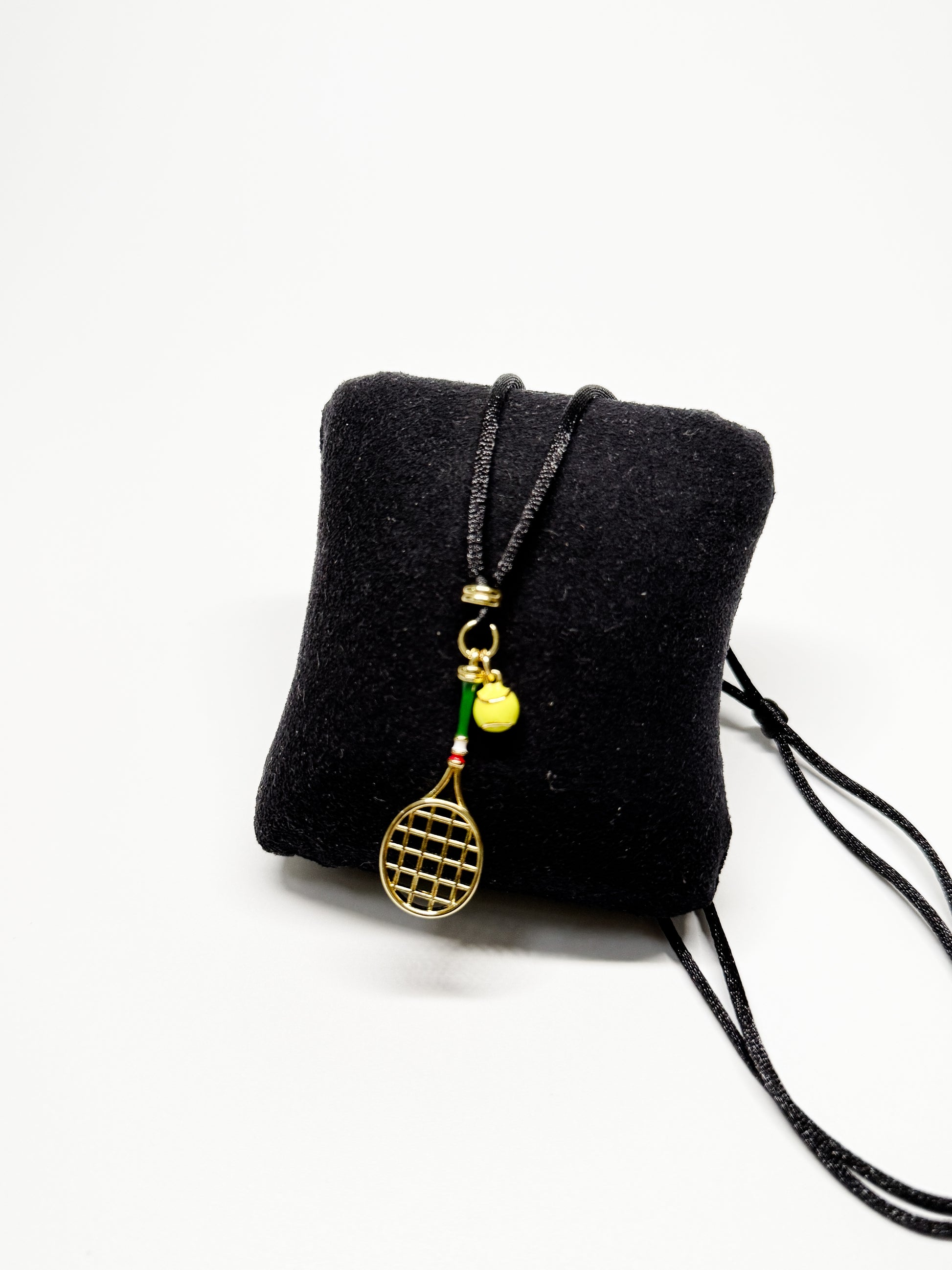 Tennis racquet necklace with steel pendant in two colors – tennis jewelry in {{ product_color }} | Aura Tide Collective | Shop Tennis racquet necklace with steel pendant in two colors online for {{ product_tags | join: ", " }} – Fast shipping worldwide.