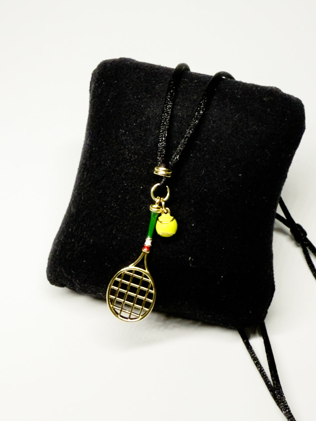 Tennis racquet necklace with steel pendant in two colors – tennis jewelry in {{ product_color }} | Aura Tide Collective | Shop Tennis racquet necklace with steel pendant in two colors online for {{ product_tags | join: ", " }} – Fast shipping worldwide.