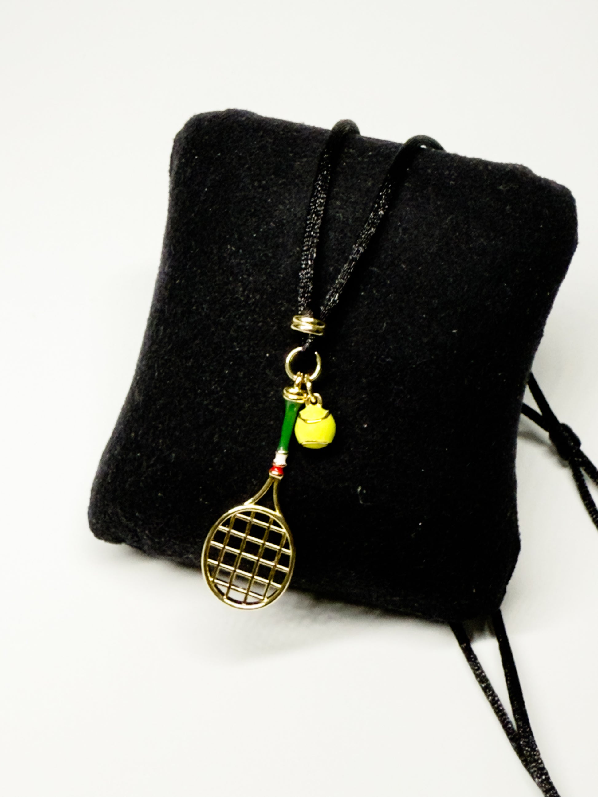 Tennis racquet necklace with steel pendant in two colors – tennis jewelry in {{ product_color }} | Aura Tide Collective | Shop Tennis racquet necklace with steel pendant in two colors online for {{ product_tags | join: ", " }} – Fast shipping worldwide.