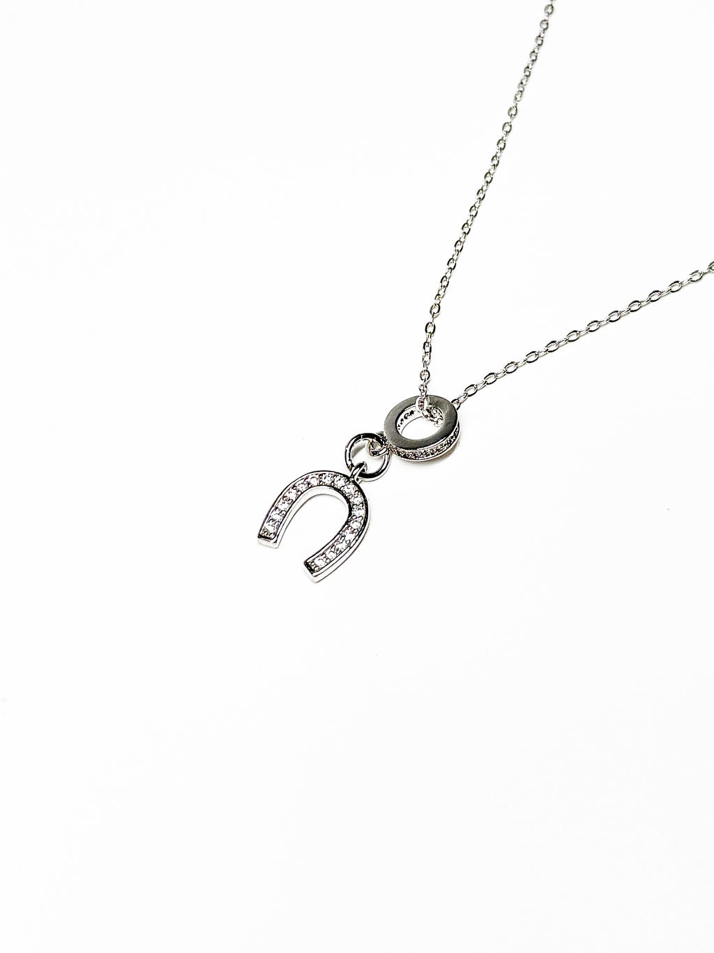 Go for a ride silver plated horseshoe necklace – Equin jewelry in {{ product_color }} | Aura Tide Collective | Shop Go for a ride silver plated horseshoe necklace online for {{ product_tags | join: ", " }} – Fast shipping worldwide.