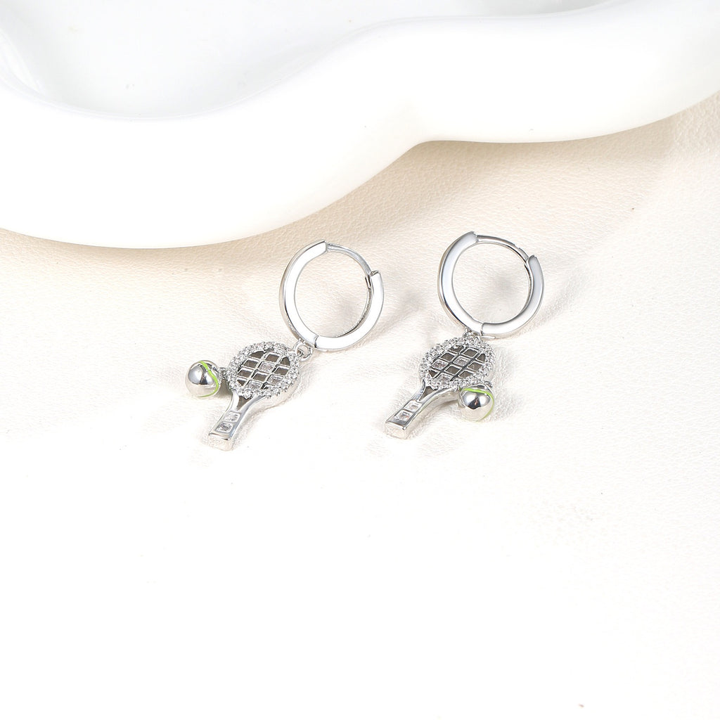 Aura flow tennis racquet earrings ear hoops – tennis jewelry in {{ product_color }} | Aura Tide Collective | Shop Aura flow tennis racquet earrings ear hoops online for {{ product_tags | join: ", " }} – Fast shipping worldwide.